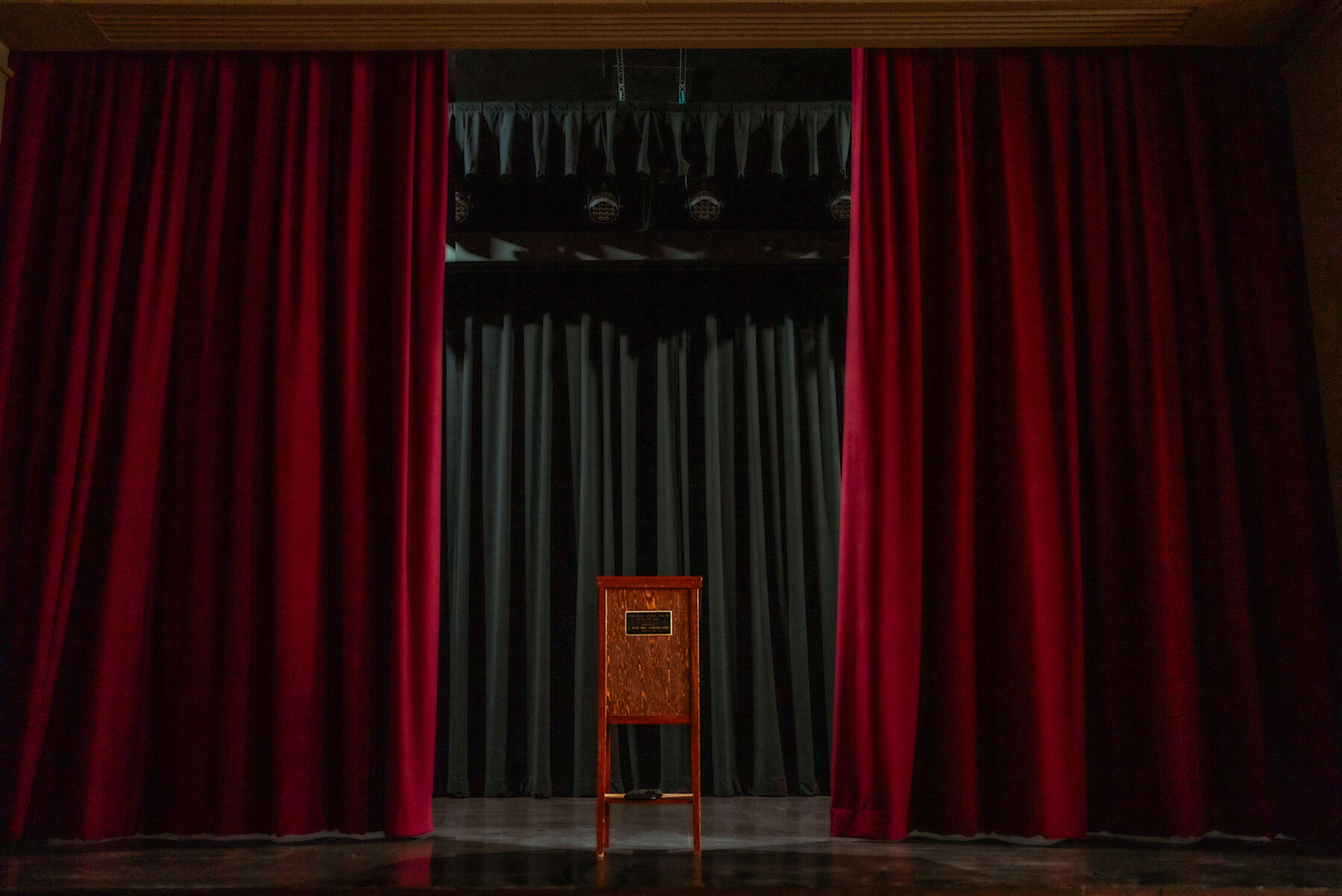 Velvet drapery with modern stage lighting