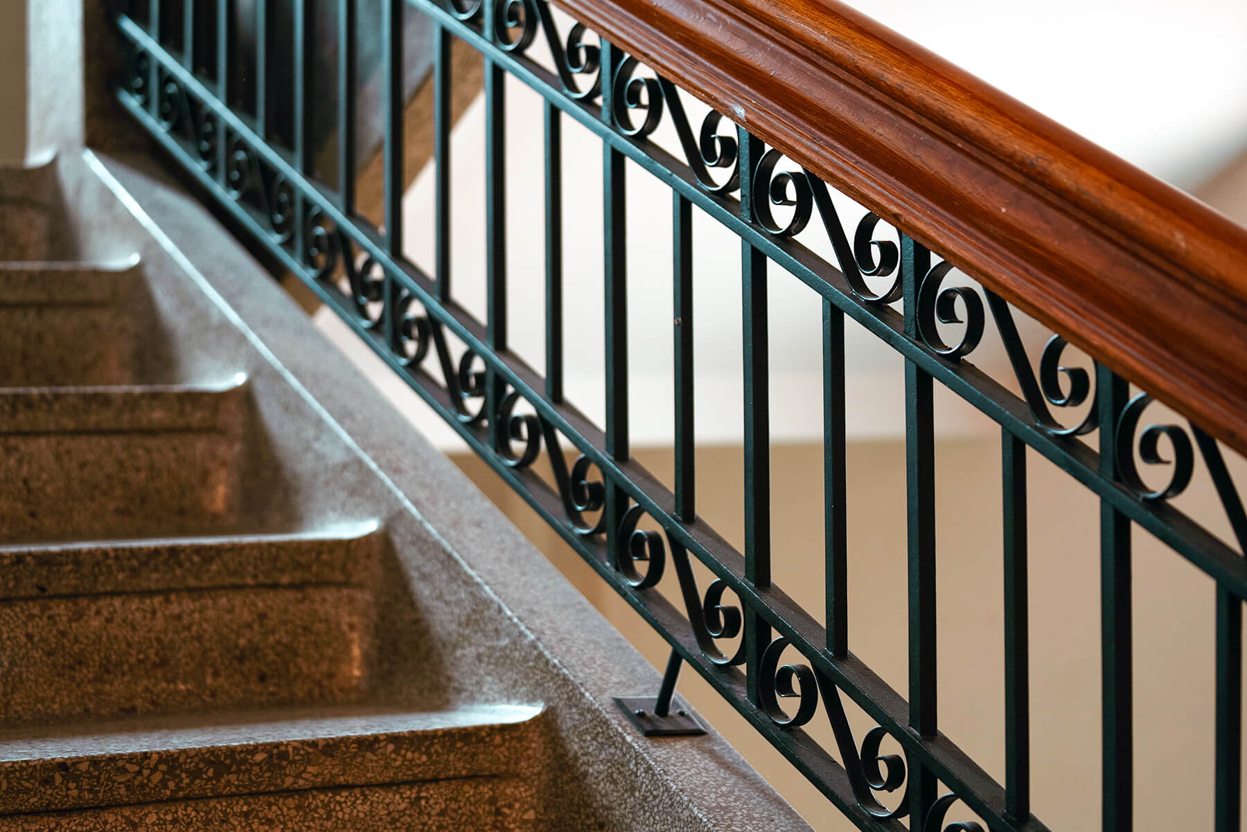 Grand staircases below heritage light fixtures